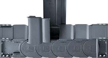 Protezione economica contro i trucioli grazie alla catena chiusa e-tube R2.1 di igus®