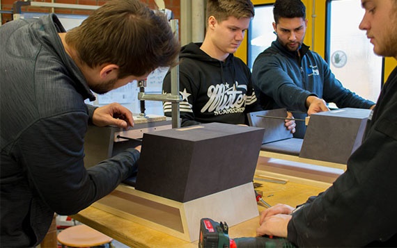 Carpenters install drylin® shafts from igus