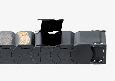 Chaînes porte-câbles pour une protection contre la saleté et les copeaux