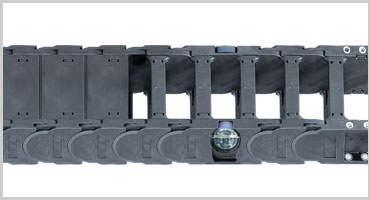 Chaînes porte-câbles à roulettes