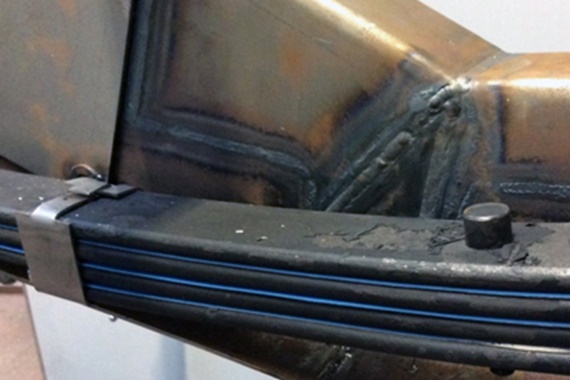 Leaf suspension with tribo-tape