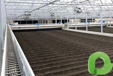 Dispositif de retournement des boues d'épuration